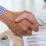 Support specialist helping client at workplace